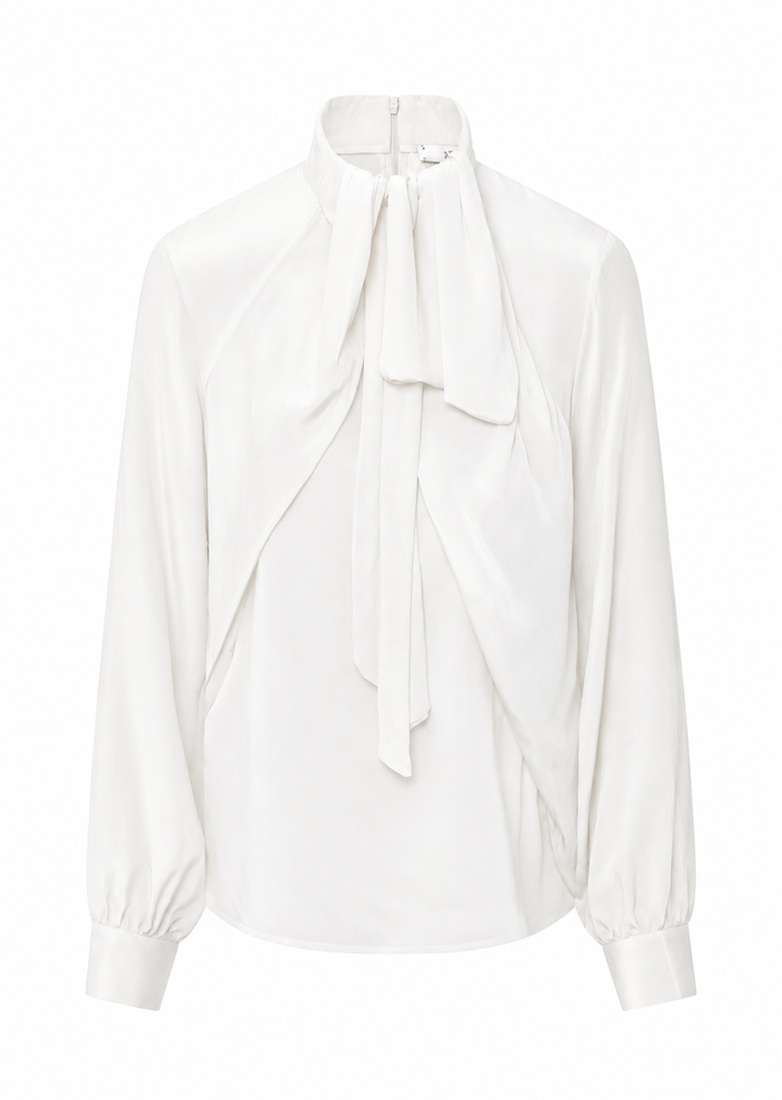 Weiße Bluse Dorothea von 0039 Italy aus Popeline mit angenähter Schluppe, langen Ärmeln und Reißverschluss am Rücken.