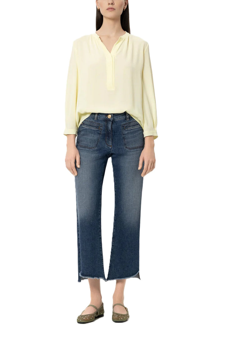 Bluse Luisa Cerano Tunika aus Seiden-Mix in gelb. Locker geschnittene Tunika-Bluse aus fließendem Seidenmix in einem zarten Gelbton. Die Bluse besitzt einen tiefen V-Ausschnitt und ¾-lange Ärmel mit geknöpften Manschetten und gefältelten Details.