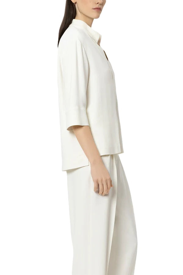 Bluse Luisa Cerano in Tunikaform in cremeweiß. Die Bluse besteht aus elastischer Viscose und ist gerade geschnitten mit 3/4 Aermeln. 