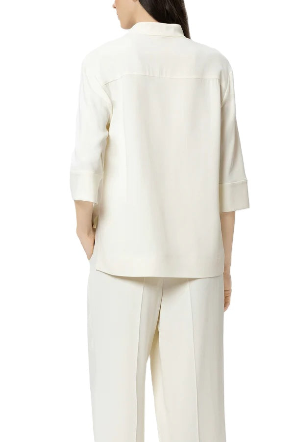 Bluse Luisa Cerano in Tunikaform in cremeweiß. Die Bluse besteht aus elastischer Viscose und ist gerade geschnitten mit 3/4 Aermeln. 