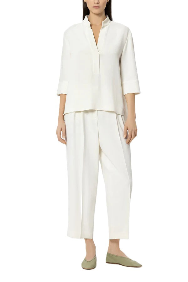 Bluse Luisa Cerano in Tunikaform in cremeweiß. Die Bluse besteht aus elastischer Viscose und ist gerade geschnitten mit 3/4 Aermeln. 