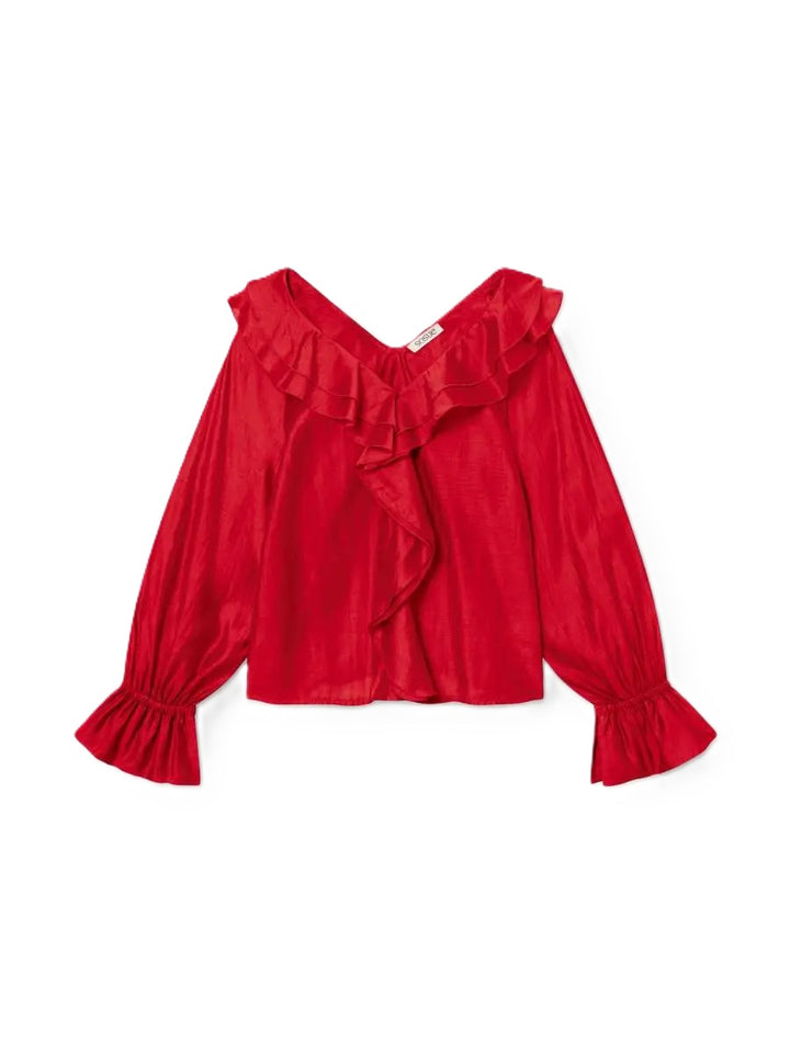 Bluse von So Sue Ruffle Long Sleeve blouse in red. Die Bluse hat einen V- Ausschnitt und große Volants vorne. Gummizug an den Manschetten. 