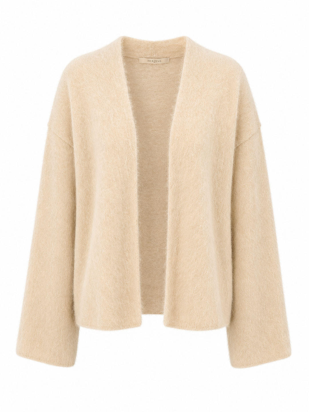 Strickweste Herzens LUISA in beige. Die schöne Cashmere-Strickjacke in beige ist der perfekte Begleiter für ein Outfit mit Bluse oder Shirt. Die Strickjacke ist offen geschnitten und hat keinen Verschluss. Die Ware ist haarig und sehr weich und angenehm zu tragen. Die Länge ist normal.