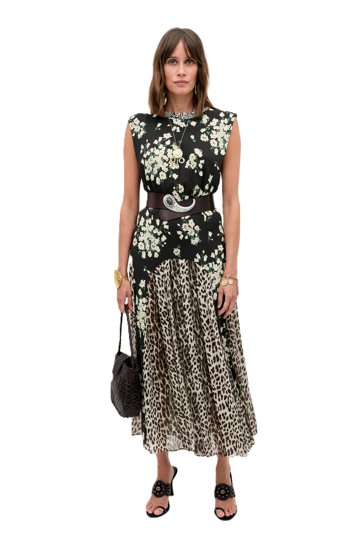 Kleid Rixo Coralie. Wunderschönes und feminines Kleid von Rixo. Das Kleid verbindert zwei verschiedene Drucke gekonnt miteinander und ist dadurch ein besonderes Highlight. Es hat keine Ärmel und ist mittellang geschnitten. Es hat einen Rundhalsausschnitt und ist an der Taille figurbetont geschnitten.