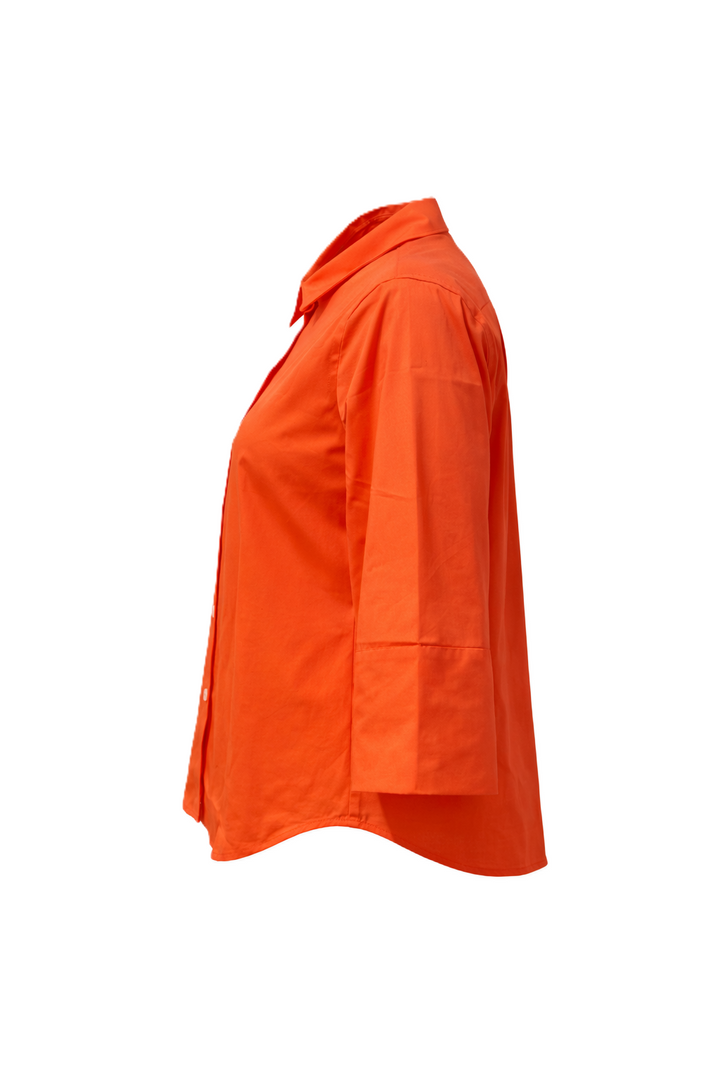 Hemdbluse The White Shirt in orange. Diese klassische Hemdbluse überzeugt mit ihrem Hemdkragen und der durchgehenden Knopfleiste. Sie hat halblange Ärmel und eine Rückenfalte.