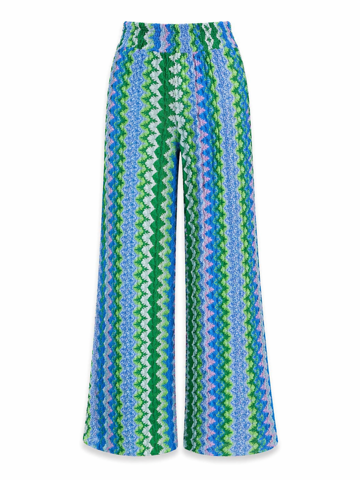 Hose Pho Firenze in blau und grün. Schöne sommerliche Hose im berühmten Zickzack-Muster. Die Hose ist gerade geschnitten und hat einen Gummibund und Taschen. Die Beinlänge ist lang und ganz leicht ausgestellt.