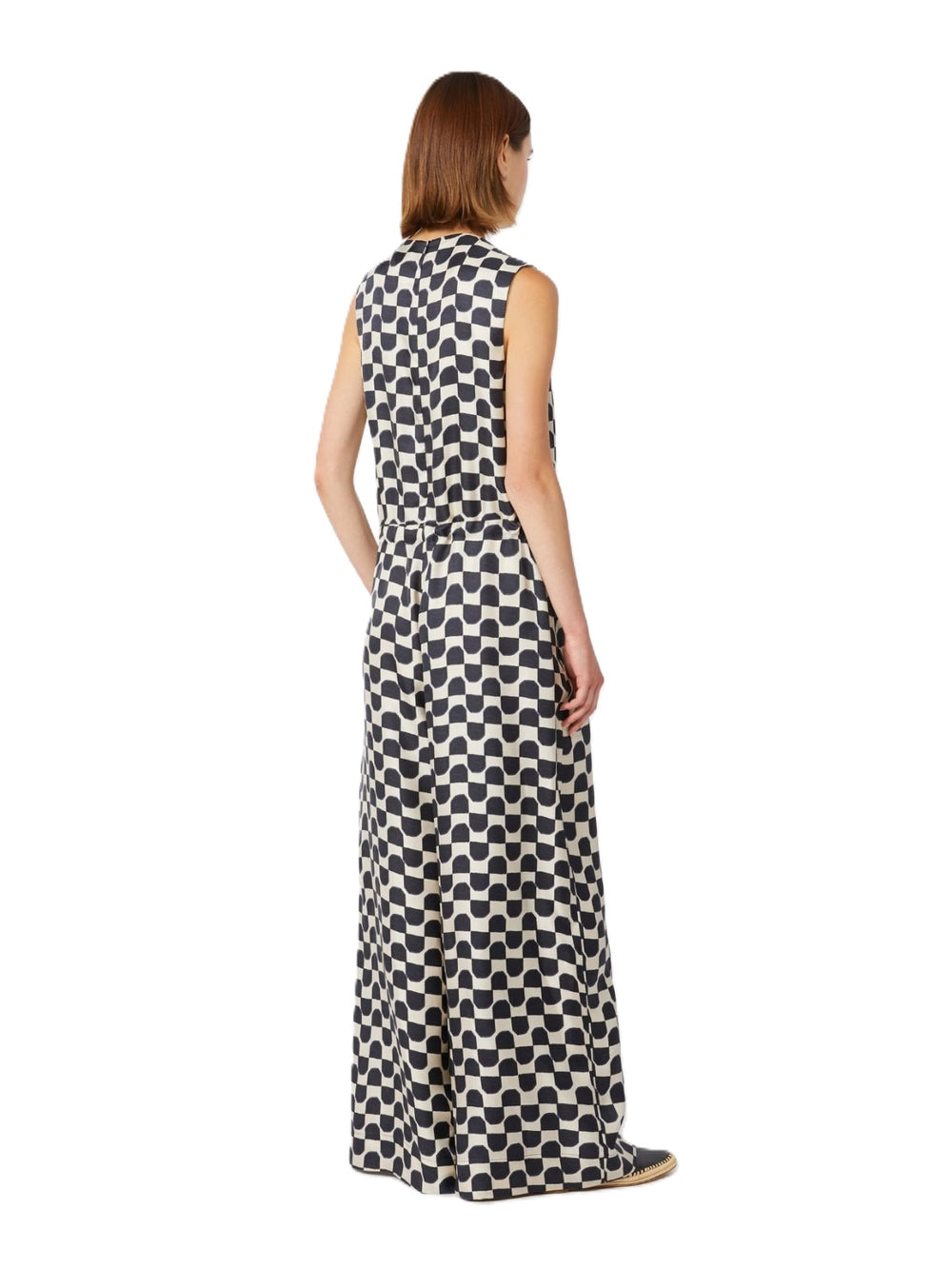 Jumpsuit von S Max Mara SMM Ronchi. Seiden Jumpsuit mit geometrischem Muster und ohne Ärmel. Der Jumpsuit hat einen Tunnelzug in der Taille und einen Reißverschluss hinten. Langes gerades Bein. 