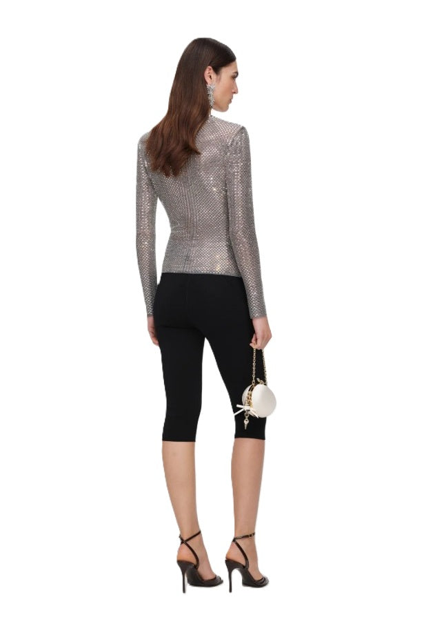 Oberteil Self-Portrait. Dieses elegante Oberteil begeistert mit funkelnden Strassverzierungen und einer modernen Wickeloptik. Der tiefe V-Ausschnitt und die langen Ärmel verleihen dem Design eine feminine Silhouette, während das leicht elastische Material und das weiche Innenfutter für angenehmen Tragekomfort sorgen. Dank der abnehmbaren Schulterpolster