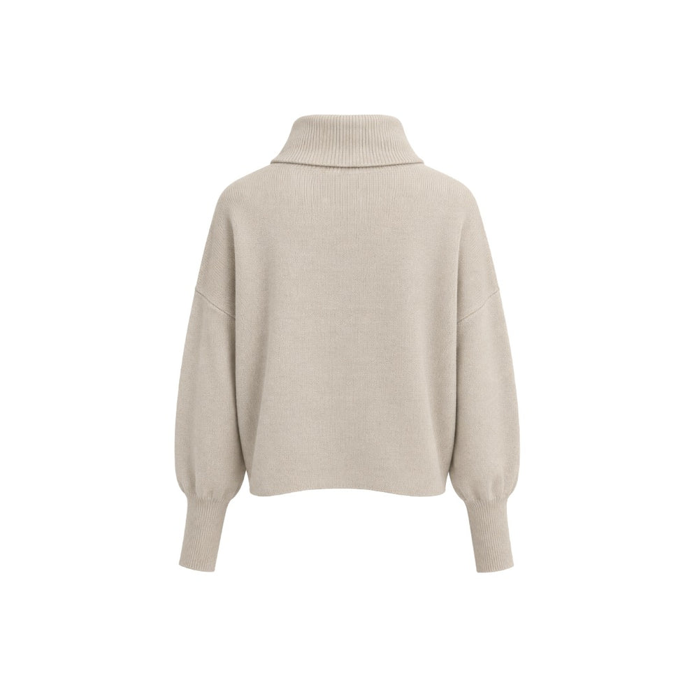 Pullover Herzens MARLA in limestone Ecru. Pullover aus hochwertigem Wolle-Kaschmir-Mix mit weicher Haptik und einem lässigen, weiten Schnitt. Großzügiger Rollkragen und überschnittenen Schultern. Voluminöse Ärmel mit langen Rippstrickbündchen. 