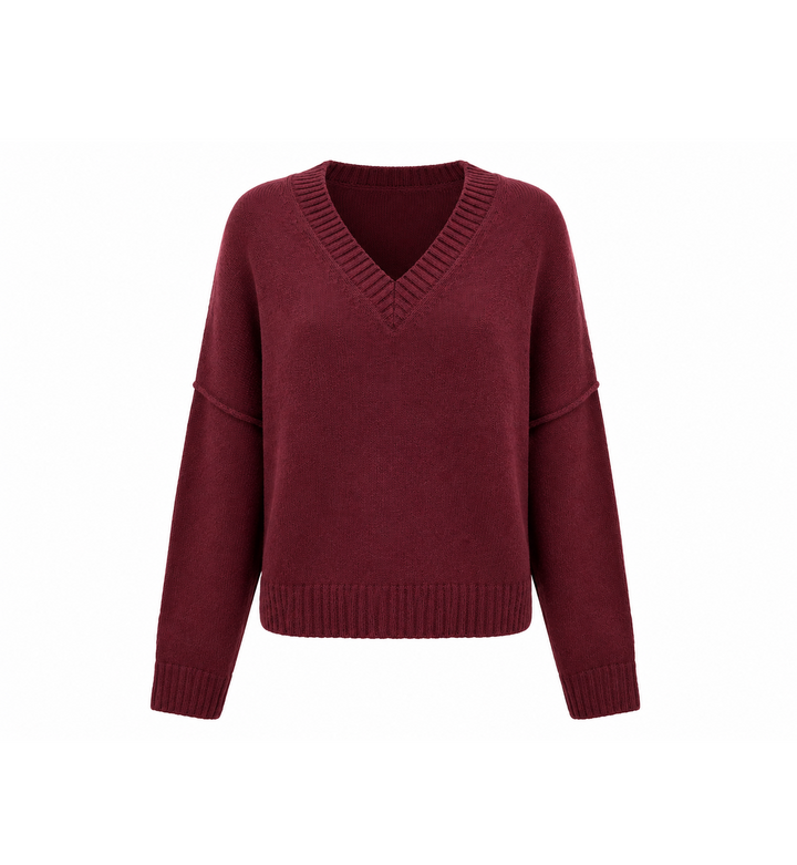 Dunkelroter Pullover von Narli mit V-Ausschnitt, überschnittenen Schultern und feinen Rippbündchen.
