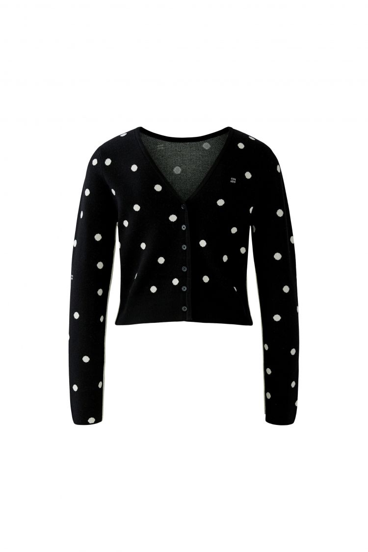 Wendbarer Pullover von Oui in schwarz mit weißen Punkten. Den Pullover kann man von zwei Seiten tragen. Auf der Rückseite befindet sich eine Knopfleiste. 