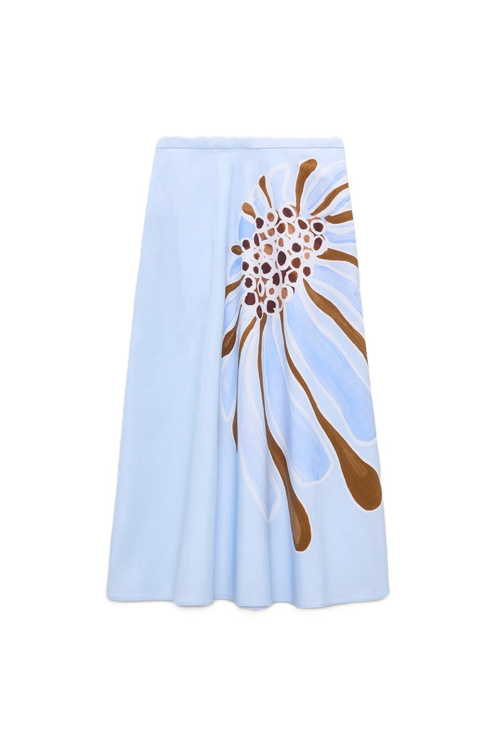 Rock von Dorothee Schumacher Floral Power Skirt in hellblau mit Blumenprint. Der Rock ist leicht ausgestellt und hat Taschen. Es gibt auch die passende Bluse dazu. 