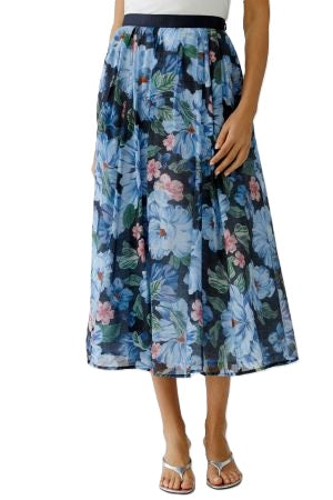 Rock Oui. Wunderschöner und leichter Sommerrock mit Blumenmuster. Der Rock hat eine leichte und luftige Ware und hat einen festen Bund und einen Reißverschluss. Mittellang 