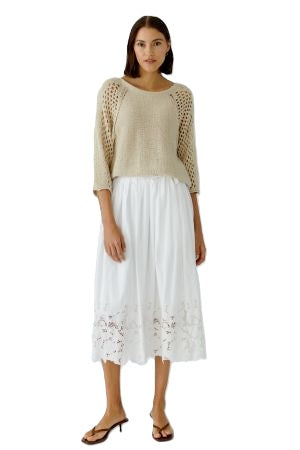 Rock Oui. Super schöner weißer Rock mit Reißverschluss auf der Rückseite. Der Rock ist weiß und hat eine Lochstickerei am Saum. Der perfekte Sommerrock. 