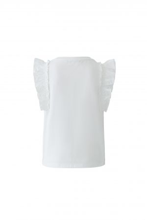 T-Shirt Oui. Super modernes Shirt aus reiner Baumwolle. Das Shirt hat einen Rundhalsausschnitt und kleine Volants am Ärmel. Es ist leicht ausgestellt und passt super gut zur Jeans. Es fällt größengerecht aus.