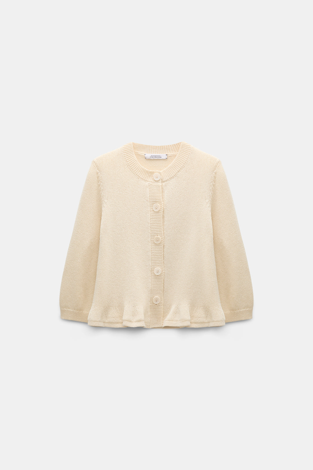 Strickjacke Dorothee Schumacher COTTON CANDY Cardigan. Der kurze Cardigan in beige ist aus weicher Baumwolle gefertigt und hat einen ausgestellten Schnitt. Der Cardigan hat einen verspielten Volant-Effekt am Saum und einen Rundhalsausschnitt. 