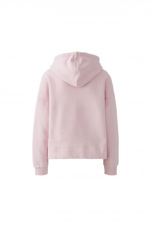 Sweatshirt Oui mit Kapuze. Kastiger, gerader Schnitt mit normaler Länge. Feminine Herzapplikation und weiche, angenehme Materialqualität aus Baumwolle und Polyester.