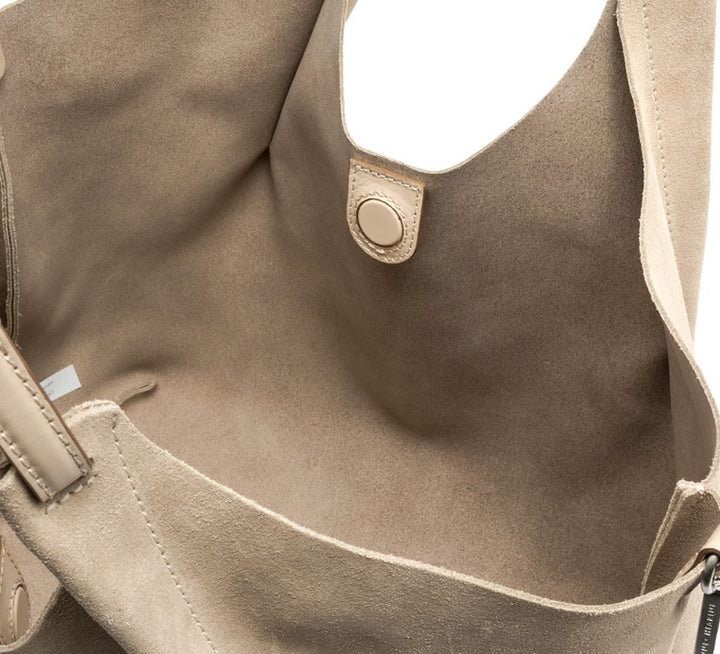 Handtasche von Gianni Chiarini in beige aus Wildleder. Eine große Tasche mit zwei Henkeln.
